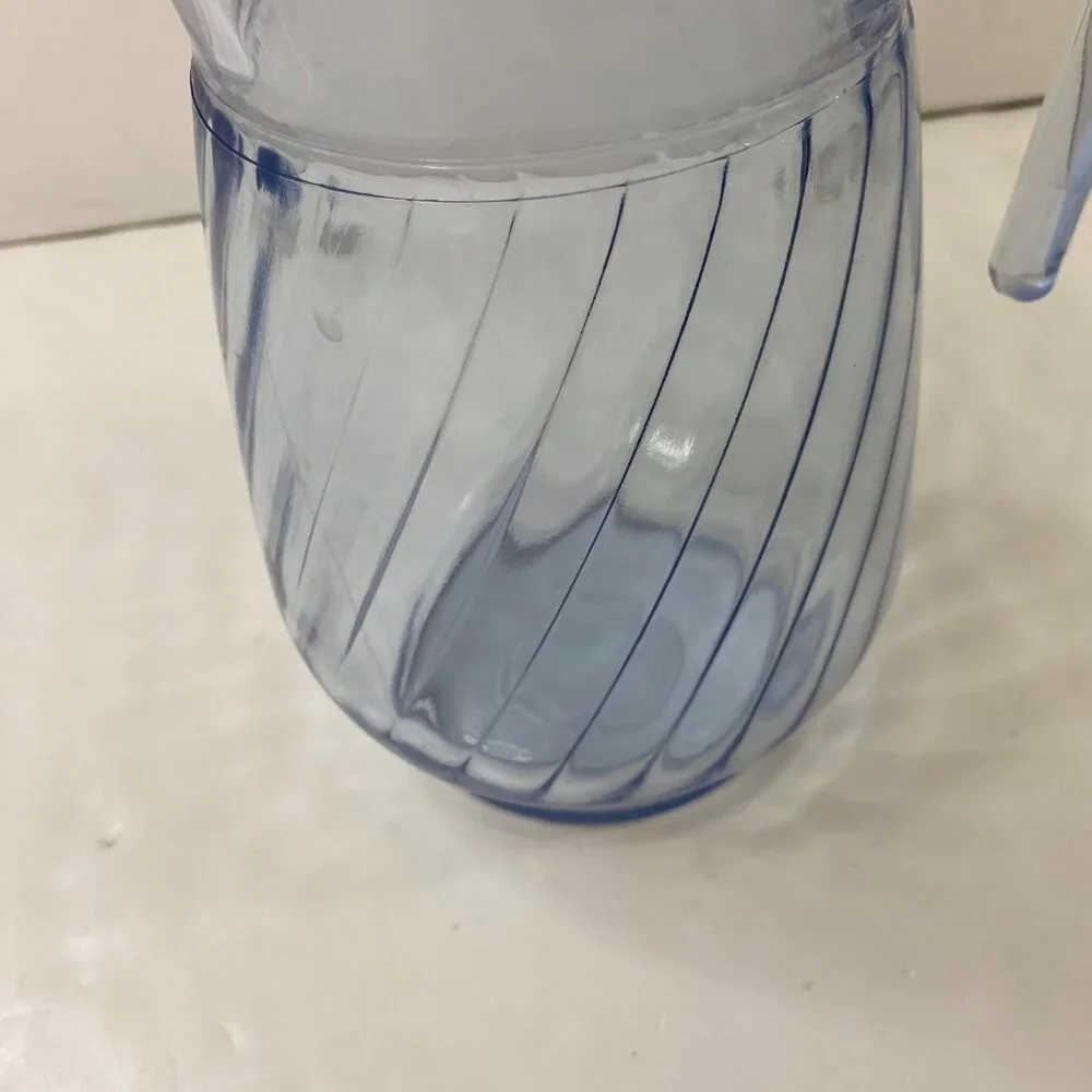 Indiana Glass Light Blue Twisted Optic Swirl Water Pitcher Ice Lip